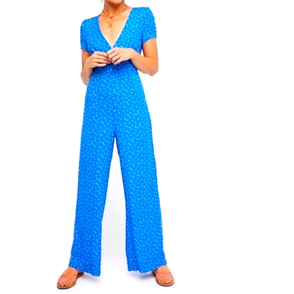 Free people blue floral print jumpsuit NEVER WORN WITH TAGS